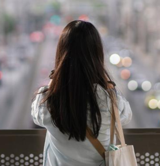 Girl looking at the city