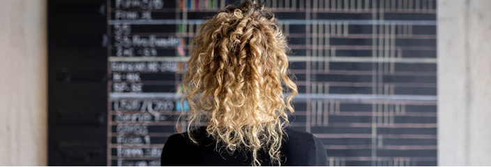 woman looking at financial stats