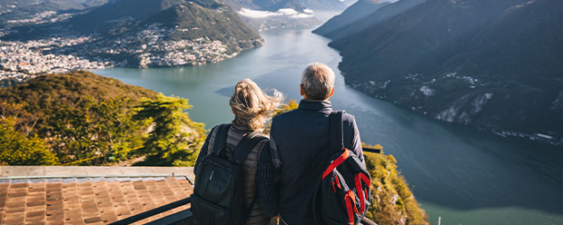 old couple overlooking river