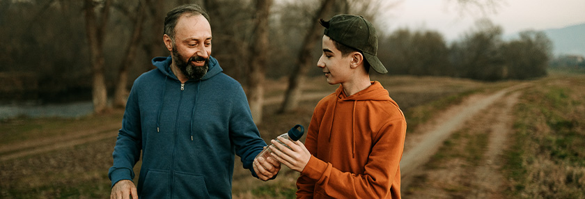 Father and son walking