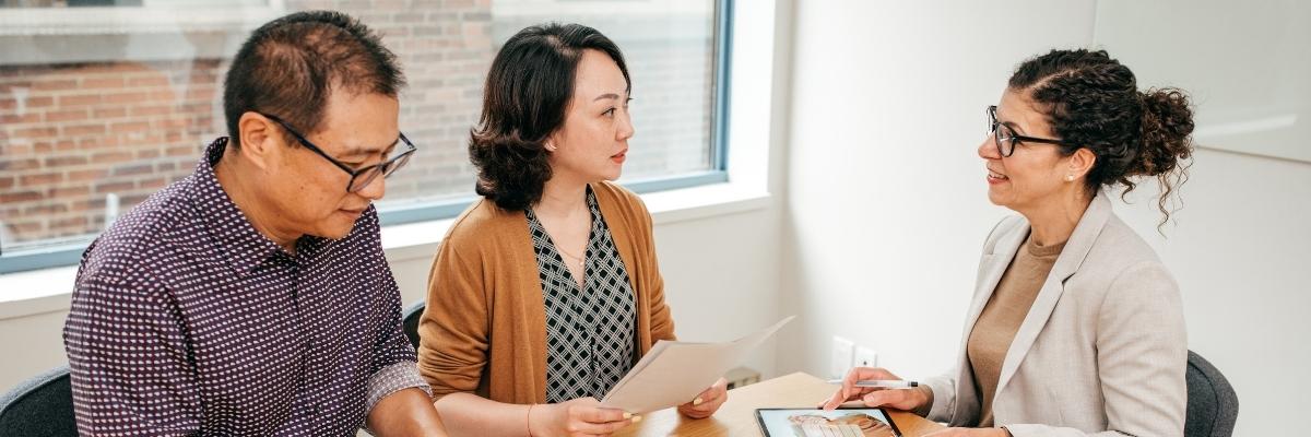 older couple speaking to an adviser